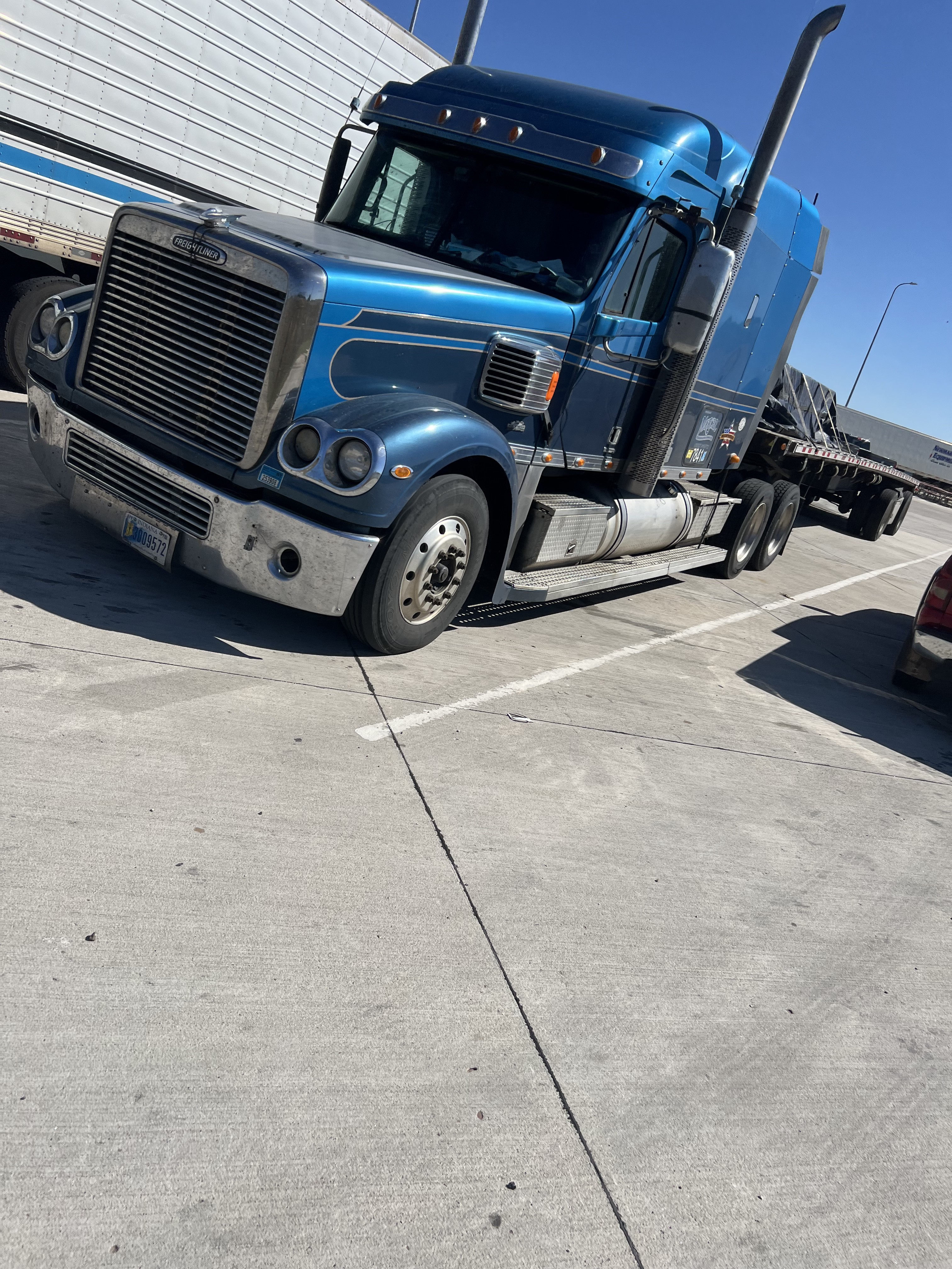Blue Freightliner truck service